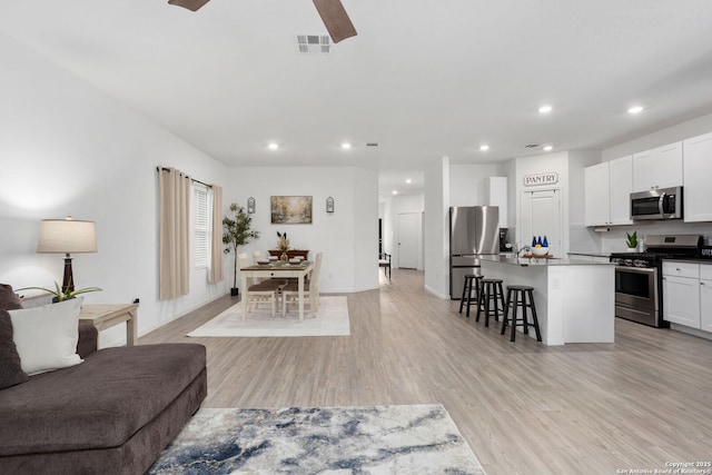 6718 Carlton Crst, San Antonio, TX 78253 - living area with recessed lighting, light wood-style flooring, and ceiling fan