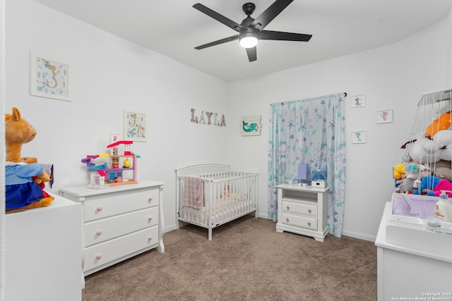 6718 Carlton Crst, San Antonio, TX 78253 - carpeted bedroom with a nursery area, baseboards, and a ceiling fan