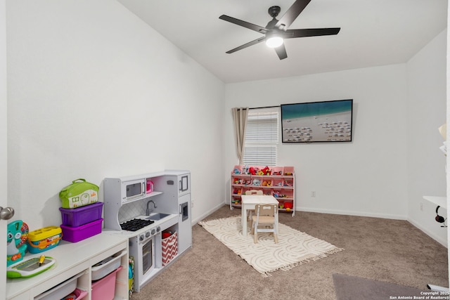 6718 Carlton Crst, San Antonio, TX 78253 - game room featuring light carpet, ceiling fan, and baseboards
