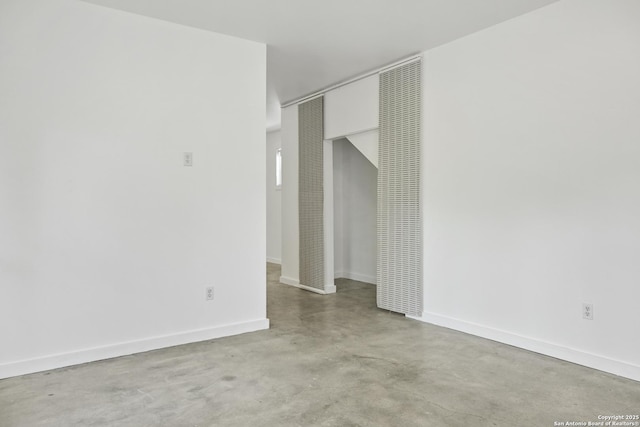 414 Clay Unit 101, & San Antonio, TX 78204 - empty room featuring finished concrete floors and baseboards