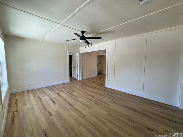 1735 W Hermine Blvd, San Antonio, TX 78201 - empty room with a ceiling fan, wood finished floors, and baseboards