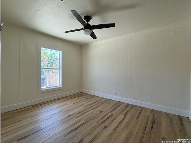 1735 W Hermine Blvd, San Antonio, TX 78201 - unfurnished room featuring wood finished floors, ceiling fan, baseboards, and ornamental molding