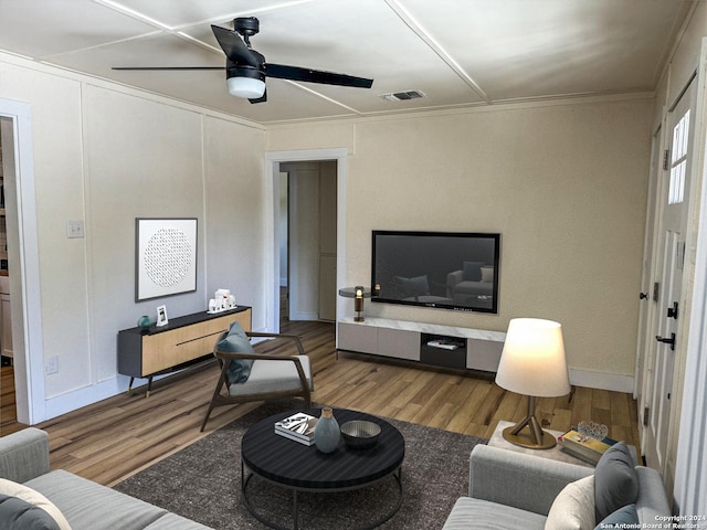 1735 W Hermine Blvd, San Antonio, TX 78201 - living room featuring wood finished floors, ceiling fan, crown molding, and baseboards