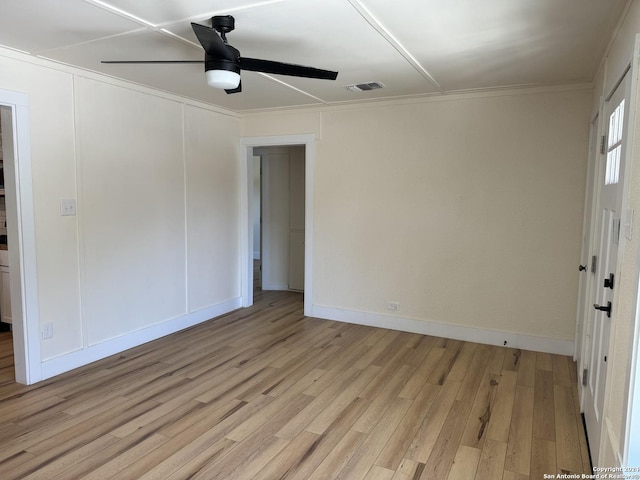 1735 W Hermine Blvd, San Antonio, TX 78201 - spare room with a ceiling fan, light wood finished floors, baseboards, and ornamental molding