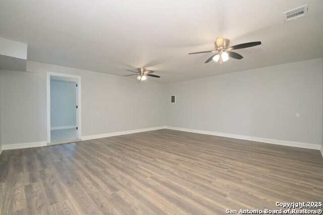 4615 Golf Vw, San Antonio, TX 78223 - empty room with ceiling fan, wood finished floors, and baseboards