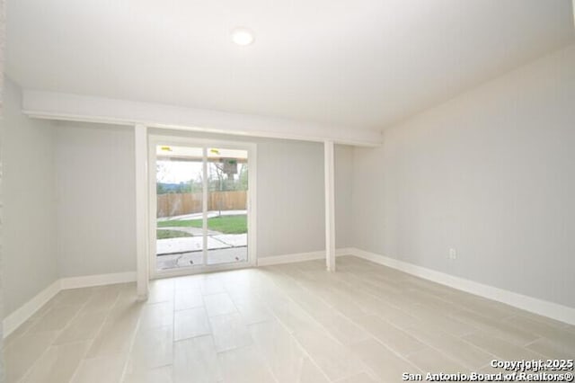 4615 Golf Vw, San Antonio, TX 78223 - unfurnished room featuring baseboards and light wood-style flooring