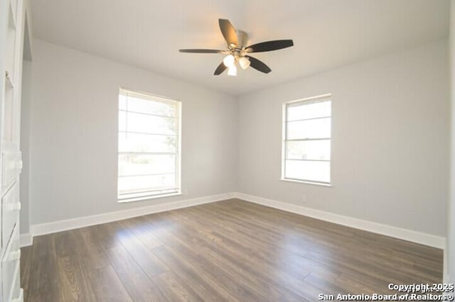 4615 Golf Vw, San Antonio, TX 78223 - unfurnished room featuring dark wood finished floors, a ceiling fan, and baseboards