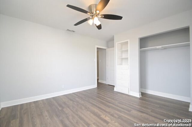 4615 Golf Vw, San Antonio, TX 78223 - unfurnished bedroom featuring dark wood-type flooring, baseboards, and a ceiling fan