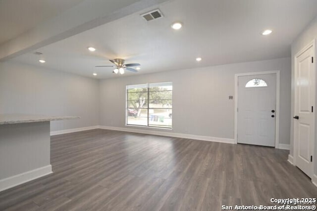 4615 Golf Vw, San Antonio, TX 78223 - unfurnished living room with ceiling fan, dark wood-type flooring, baseboards, and recessed lighting