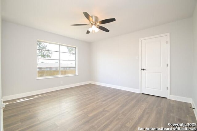 4615 Golf Vw, San Antonio, TX 78223 - empty room featuring a ceiling fan, wood finished floors, and baseboards