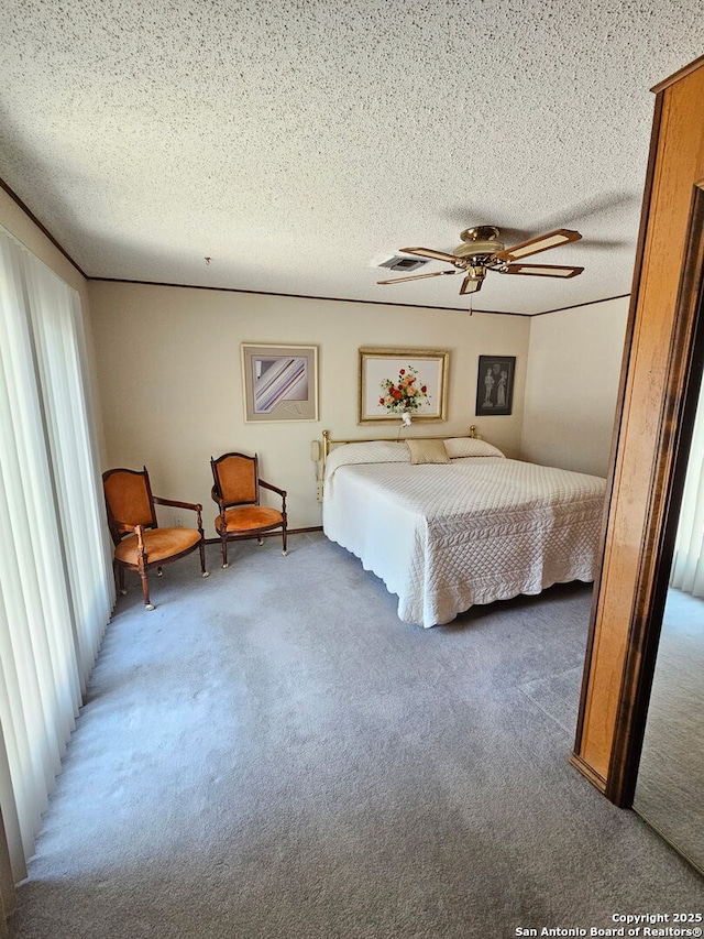 109 Cueva, Hollywood Park, TX 78232 - bedroom with carpet flooring, a textured ceiling, and a ceiling fan