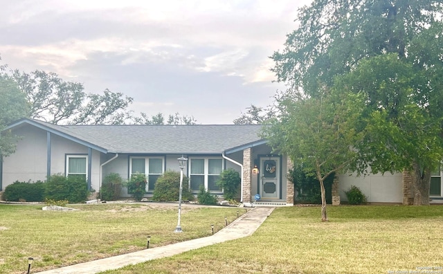 109 Cueva, Hollywood Park, TX 78232 - view of front of property featuring a front lawn and a shingled roof