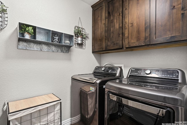 184 Great Oaks Ln, Vernia, TX 78121 - clothes washing area with washer and dryer, cabinet space, and baseboards