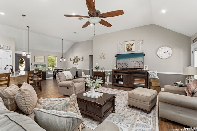184 Great Oaks Ln, Vernia, TX 78121 - living room featuring vaulted ceiling, ceiling fan, wood finished floors, and recessed lighting