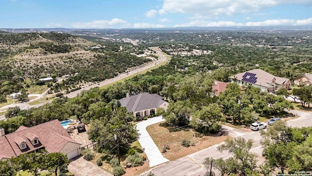573 Mountain Oaks Dr, Canyon Lake, TX 78133 - aerial perspective of suburban area
