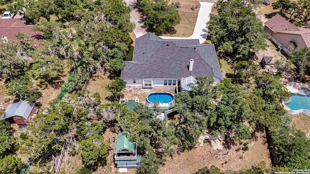 573 Mountain Oaks Dr, Canyon Lake, TX 78133 - view from above of property featuring a pool area