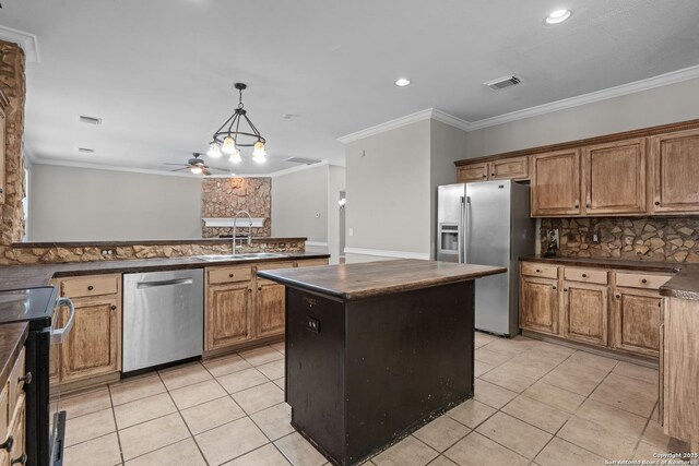 25233 Battle Lk, San Antonio, TX 78260 - kitchen featuring stainless steel appliances, a sink, dark countertops, light tile patterned floors, and backsplash