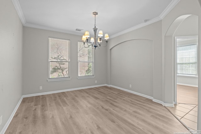 25233 Battle Lk, San Antonio, TX 78260 - spare room with a chandelier, ornamental molding, light wood-style floors, baseboards, and arched walkways