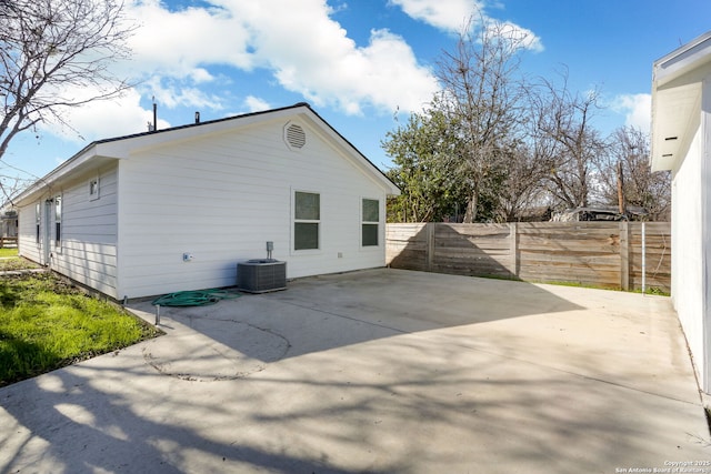 239 Surrey, San Antonio, TX 78225 - view of side of property featuring a patio area, fence, and cooling unit