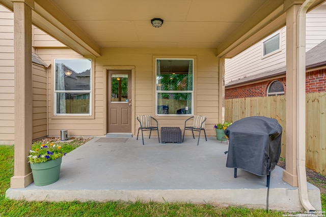 214 Ridge Blf, Cibolo, TX 78108 - view of patio with fence, area for grilling, and outdoor dining space