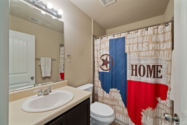 184 Jolie Cir, Boerne, TX 78015 - bathroom with a textured wall, toilet, vanity, a textured ceiling, and curtained shower