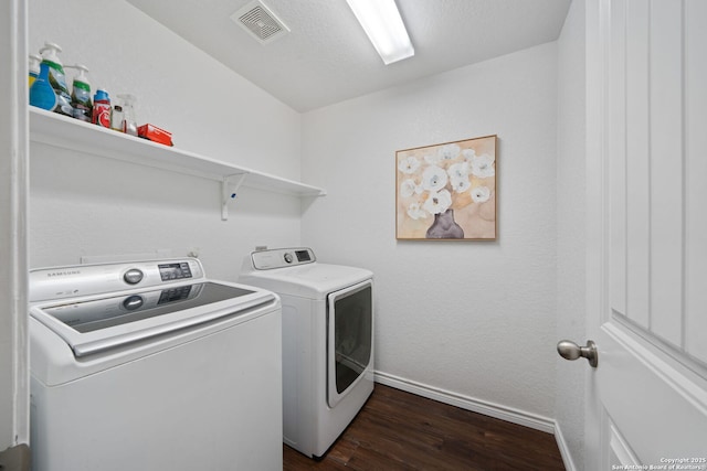 184 Jolie Cir, Boerne, TX 78015 - laundry room with washer and clothes dryer, baseboards, and dark wood-style floors