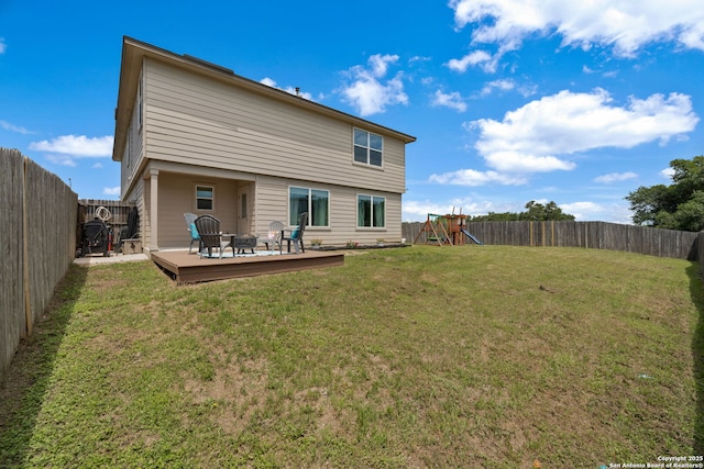 184 Jolie Cir, Boerne, TX 78015 - back of property with a playground, an outdoor fire pit, and a deck