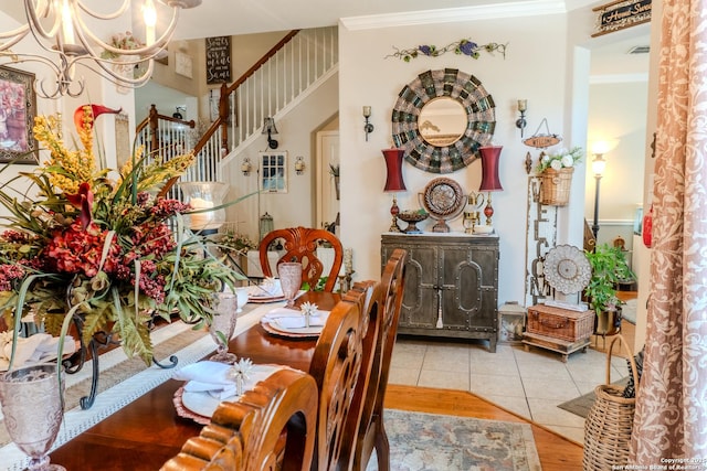 3351 Highline Trl, San Antonio, TX 78261 - dining room featuring a chandelier, crown molding, stairs, and wood finished floors