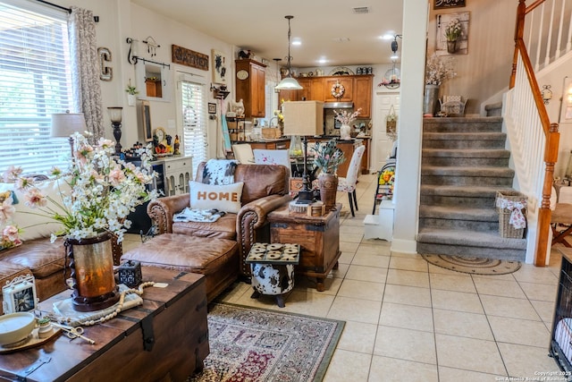 3351 Highline Trl, San Antonio, TX 78261 - living area with light tile patterned flooring, stairs, and recessed lighting