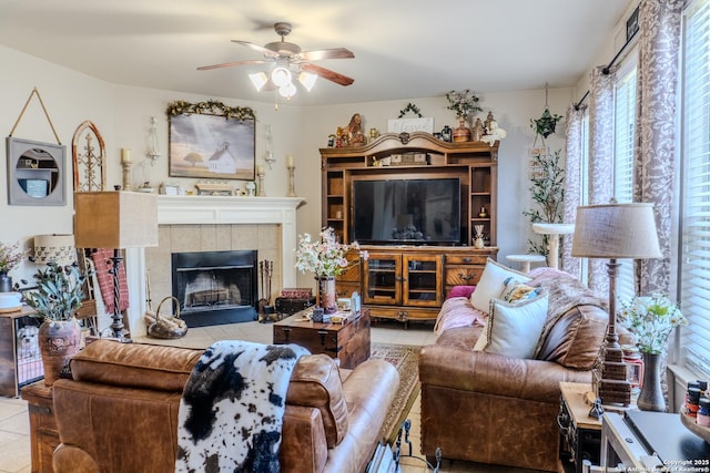 3351 Highline Trl, San Antonio, TX 78261 - tiled living room with ceiling fan and a tile fireplace
