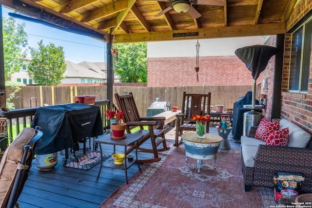 3351 Highline Trl, San Antonio, TX 78261 - fenced backyard with ceiling fan, an outdoor hangout area, and area for grilling