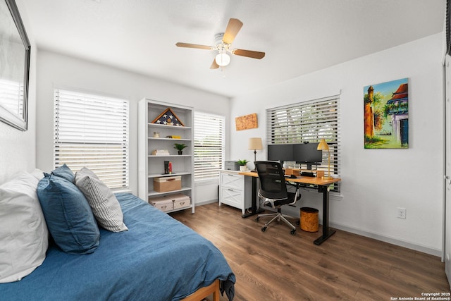 351 Barbara, San Antonio, TX 78216 - bedroom featuring dark wood finished floors, an office area, a ceiling fan, and baseboards