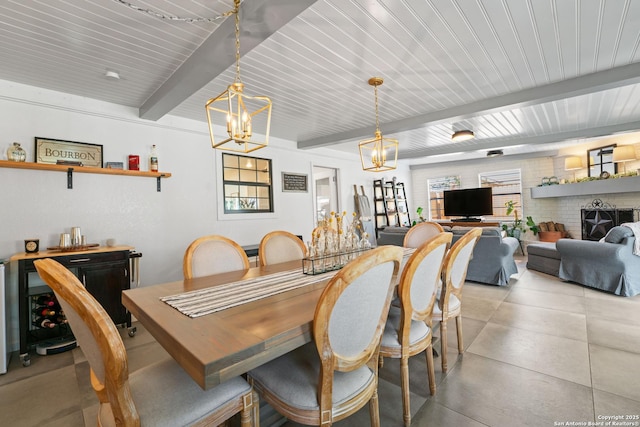 351 Barbara, San Antonio, TX 78216 - dining room with a chandelier and beamed ceiling