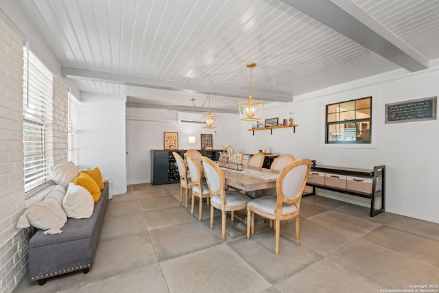 351 Barbara, San Antonio, TX 78216 - dining area featuring beamed ceiling, a wall unit AC, concrete flooring, and baseboards