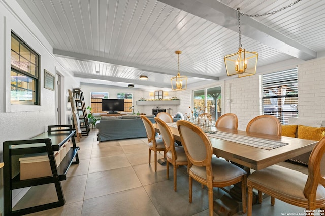 351 Barbara, San Antonio, TX 78216 - dining space featuring a chandelier, beam ceiling, and tile patterned floors