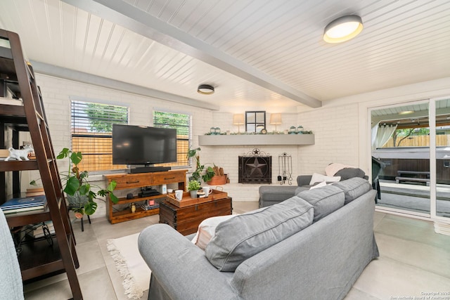 351 Barbara, San Antonio, TX 78216 - living area with brick wall, a brick fireplace, and beam ceiling