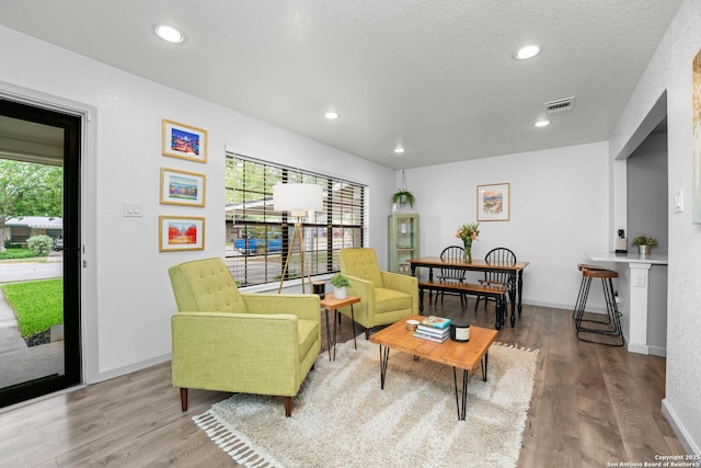 351 Barbara, San Antonio, TX 78216 - living room with healthy amount of natural light, wood finished floors, and recessed lighting