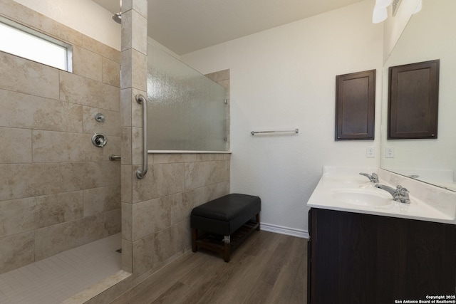 22363 Escalante Run, San Antonio, TX 78261 - full bath with wood finished floors, walk in shower, double vanity, and baseboards