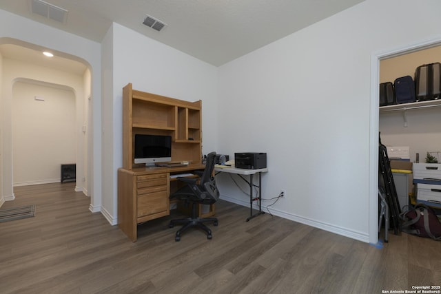 22363 Escalante Run, San Antonio, TX 78261 - home office featuring wood finished floors, arched walkways, baseboards, and recessed lighting