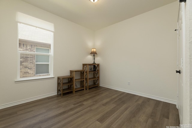 22363 Escalante Run, San Antonio, TX 78261 - empty room with dark wood-type flooring and baseboards