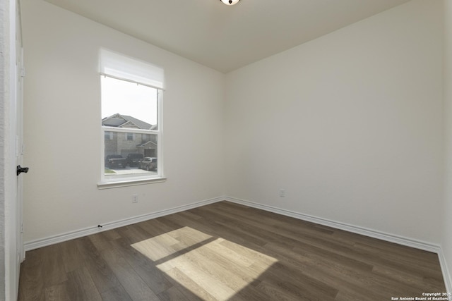 22363 Escalante Run, San Antonio, TX 78261 - spare room featuring dark wood-type flooring and baseboards