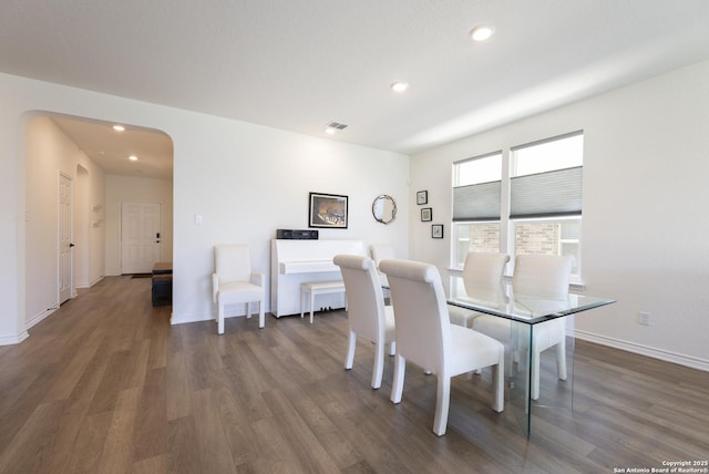 22363 Escalante Run, San Antonio, TX 78261 - dining space with arched walkways, recessed lighting, wood finished floors, and baseboards