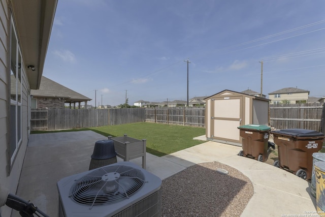 22363 Escalante Run, San Antonio, TX 78261 - view of patio featuring central AC, a storage shed, and an outbuilding