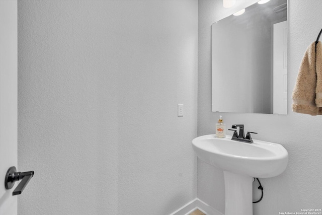 1624 Dirndl, New Braunfels, TX 78132 - bathroom with baseboards and a sink