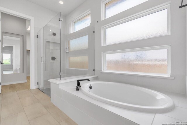 1624 Dirndl, New Braunfels, TX 78132 - full bathroom with a bath, a shower stall, and tile patterned floors