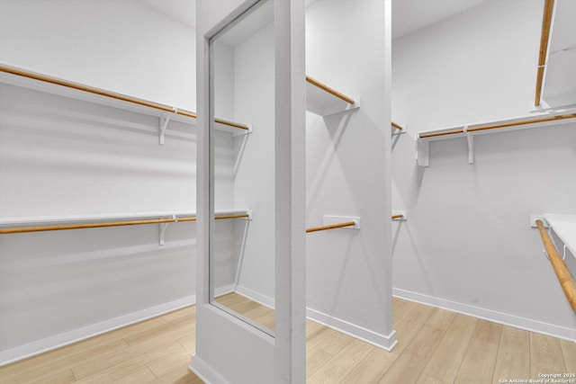 1624 Dirndl, New Braunfels, TX 78132 - walk in closet with wood finished floors