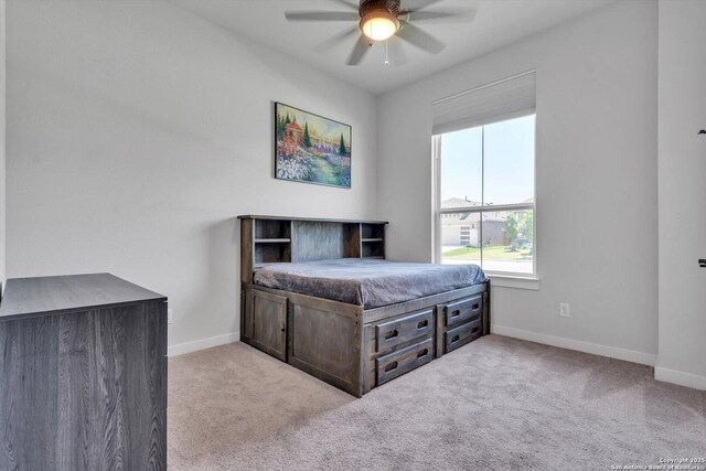 1624 Dirndl, New Braunfels, TX 78132 - bedroom with light carpet, baseboards, and a ceiling fan