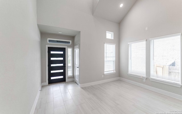 13226 Blue Flame, San Antonio, TX 78245 - entrance foyer featuring a high ceiling, plenty of natural light, baseboards, and recessed lighting