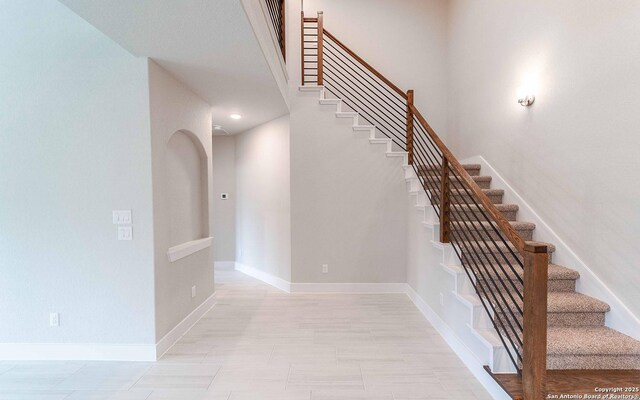 13226 Blue Flame, San Antonio, TX 78245 - staircase featuring baseboards
