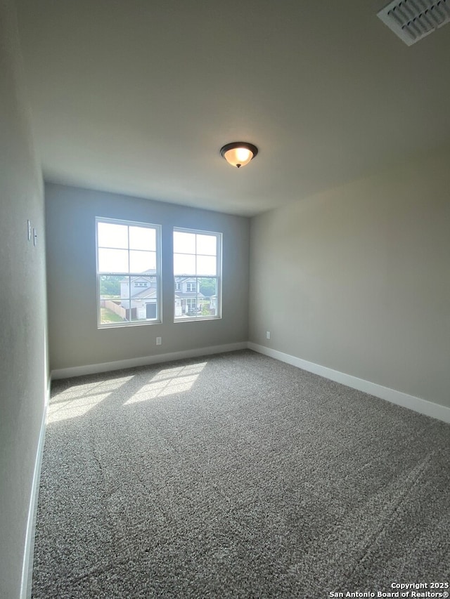 11111 Carlyle Spgs, Live Oak, TX 78233 - carpeted empty room featuring baseboards